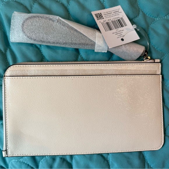 Kate SpadeLucy Crinkle Patent Medium L-zip Wristlet in Cream - Picture 5 of 8
